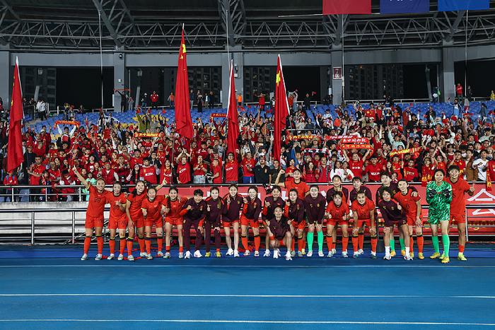 关于亚洲女足锦标赛上，中国队员取得关键胜利的信息